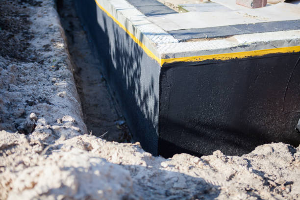 Professional Waterproofing technician working in Montville, NJ